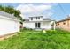 A home backyard and garage offer outdoor space, providing privacy and room to relax and enjoy the outdoors at 2413 Fowler St, Anderson, IN 46012