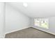 Bright bedroom featuring neutral walls, carpet, and natural light from the window at 2413 Fowler St, Anderson, IN 46012