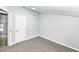Comfortable bedroom with plush carpeting and ample natural light at 2413 Fowler St, Anderson, IN 46012