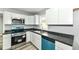Updated kitchen featuring stainless steel appliances, crisp white cabinets, and stylish sink at 2413 Fowler St, Anderson, IN 46012