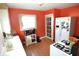 Well-lit kitchen featuring modern appliances, ample cabinet space, and a charming window at 2616 Jackson St, Anderson, IN 46016