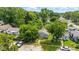An aerial view of the cozy home nestled in a lush, green neighborhood at 3251 Mars Hill St, Indianapolis, IN 46221