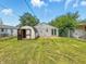 A view of the backyard showing the shed and the back of the house at 3251 Mars Hill St, Indianapolis, IN 46221
