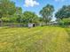 A large backyard featuring a shed and ample green space at 3251 Mars Hill St, Indianapolis, IN 46221