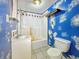 Unique bathroom with a sink, toilet, and bathtub-shower combination at 3251 Mars Hill St, Indianapolis, IN 46221