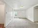 Bedroom with neutral carpet and walls, window for natural light, and convenient access to other spaces at 3251 Mars Hill St, Indianapolis, IN 46221