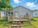 A close view of the front exterior of the home with a charming porch at 3251 Mars Hill St, Indianapolis, IN 46221