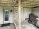 Basement door and storage space under the deck, offering functional outdoor access and convenience at 3287 Buckmoor Pkwy, Greenwood, IN 46143