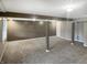 Large finished basement with neutral carpet and recessed lighting at 3287 Buckmoor Pkwy, Greenwood, IN 46143