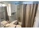 Cozy bathroom features a shower-tub combination and a mirrored vanity at 3287 Buckmoor Pkwy, Greenwood, IN 46143