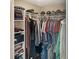 Walk in closet featuring ample shelving with hanging storage, a variety of garments, and hat collection at 3287 Buckmoor Pkwy, Greenwood, IN 46143