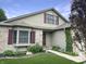 Charming two-story home with a well-manicured lawn and mature landscaping, a welcoming entrance at 3287 Buckmoor Pkwy, Greenwood, IN 46143