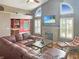 Spacious living room with a fireplace, large windows, and an open layout at 3287 Buckmoor Pkwy, Greenwood, IN 46143