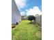 Fenced backyard with large lawn at 3341 Orchard Valley Dr, Columbus, IN 47203