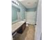 Bathroom with vanity sink, toilet, and shower/tub combo, showcasing modern fixtures at 3341 Orchard Valley Dr, Columbus, IN 47203