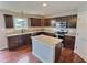 Modern kitchen with island and stainless appliances with a pantry at 3341 Orchard Valley Dr, Columbus, IN 47203