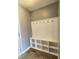 Mud room features cubbies and hooks for storage at 3341 Orchard Valley Dr, Columbus, IN 47203