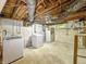 Spacious unfinished basement area with laundry machines and access to utilities at 3422 Hillside Ave, Indianapolis, IN 46218
