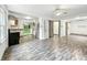 Bright open concept living space with hardwood floors, updated appliances, and ample natural light at 3422 Hillside Ave, Indianapolis, IN 46218