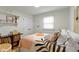 Bright bedroom with a window, complemented by tasteful decor and modern shelving for a cozy ambiance at 3841 Meridee Dr, Indianapolis, IN 46237