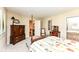 Comfortable bedroom with neutral walls, with easy access to an adjoining room at 392 Sandbrook Dr, Noblesville, IN 46062