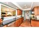 Modern kitchen features granite countertops, stainless steel appliances, and wood cabinets at 392 Sandbrook Dr, Noblesville, IN 46062