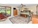 Bright main bedroom boasts a sliding glass door to a patio, a ceiling fan, and decor at 392 Sandbrook Dr, Noblesville, IN 46062