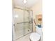 Accessible shower with glass doors and safety bars for added convenience at 392 Sandbrook Dr, Noblesville, IN 46062