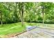 Overlooking a lush backyard, the wood deck offers privacy at 4115 Tansel Rd, Indianapolis, IN 46234