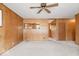 Cozy living room with neutral carpet, built-in shelving, and ample space for relaxing and entertaining at 414 S Green St, Brownsburg, IN 46112