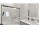 Clean bathroom with a bright, glass-enclosed shower, modern sink, and neutral colored vanity at 4250 Blackford Rd, Bargersville, IN 46106