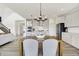 View of dining room with access to open kitchen boasting modern appliances at 4250 Blackford Rd, Bargersville, IN 46106