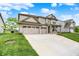 Traditional two-story home featuring a brick and siding facade and a spacious three-car garage at 4250 Blackford Rd, Bargersville, IN 46106