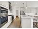 Modern kitchen features stainless appliances, island with seating, and ample cabinetry at 4250 Blackford Rd, Bargersville, IN 46106