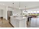 Modern kitchen featuring a large island, stainless steel appliances, and ample storage at 4250 Blackford Rd, Bargersville, IN 46106