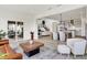 Bright and open living room with a sliding glass door, modern furnishings, and hardwood flooring at 4250 Blackford Rd, Bargersville, IN 46106