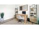 Well-lit home office featuring a wooden desk, modern shelving, and stylish decor for a productive workspace at 4250 Blackford Rd, Bargersville, IN 46106