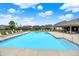 Large community pool with ample seating and views of nearby homes, perfect for summer fun at 4250 Blackford Rd, Bargersville, IN 46106