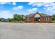 Pool house with a brick facade, providing a convenient changing and restroom area for community members at 4250 Blackford Rd, Bargersville, IN 46106