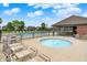 Resort-style pool and jacuzzi with ample lounge chairs and shaded seating areas for residents at 4250 Blackford Rd, Bargersville, IN 46106