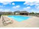 Sparkling community pool surrounded by lounge chairs, ideal for relaxing and enjoying the summer sun at 4250 Blackford Rd, Bargersville, IN 46106