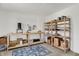 Large room features tables and shelving, ideal for a studio or hobby space at 4250 Blackford Rd, Bargersville, IN 46106