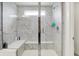 Luxurious bathroom with a spacious glass-enclosed shower featuring marble tiles and a built-in bench at 4250 Blackford Rd, Bargersville, IN 46106