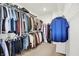 Organized walk-in closet with ample hanging space and shelving for clothes and accessories at 4250 Blackford Rd, Bargersville, IN 46106