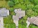 Aerial view of backyard, patio, and surrounding landscaping of a large home in a residential neighborhood at 427 Quincy Pl, Westfield, IN 46074