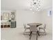 Finished basement with modern lighting, dining table, and shelving for storage at 427 Quincy Pl, Westfield, IN 46074
