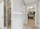 Bathroom features a glass-enclosed tiled shower, closet with an abundance of storage, and neutral paint at 427 Quincy Pl, Westfield, IN 46074