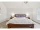 Bedroom features shiplap accent wall, neutral carpet, and modern light fixture at 427 Quincy Pl, Westfield, IN 46074