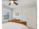 Comfortable bedroom with carpet, features a window view, double door closet, and dresser at 427 Quincy Pl, Westfield, IN 46074