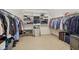 Walk-in closet with organized shelving, hanging racks, and ample space for clothing and accessories at 427 Quincy Pl, Westfield, IN 46074